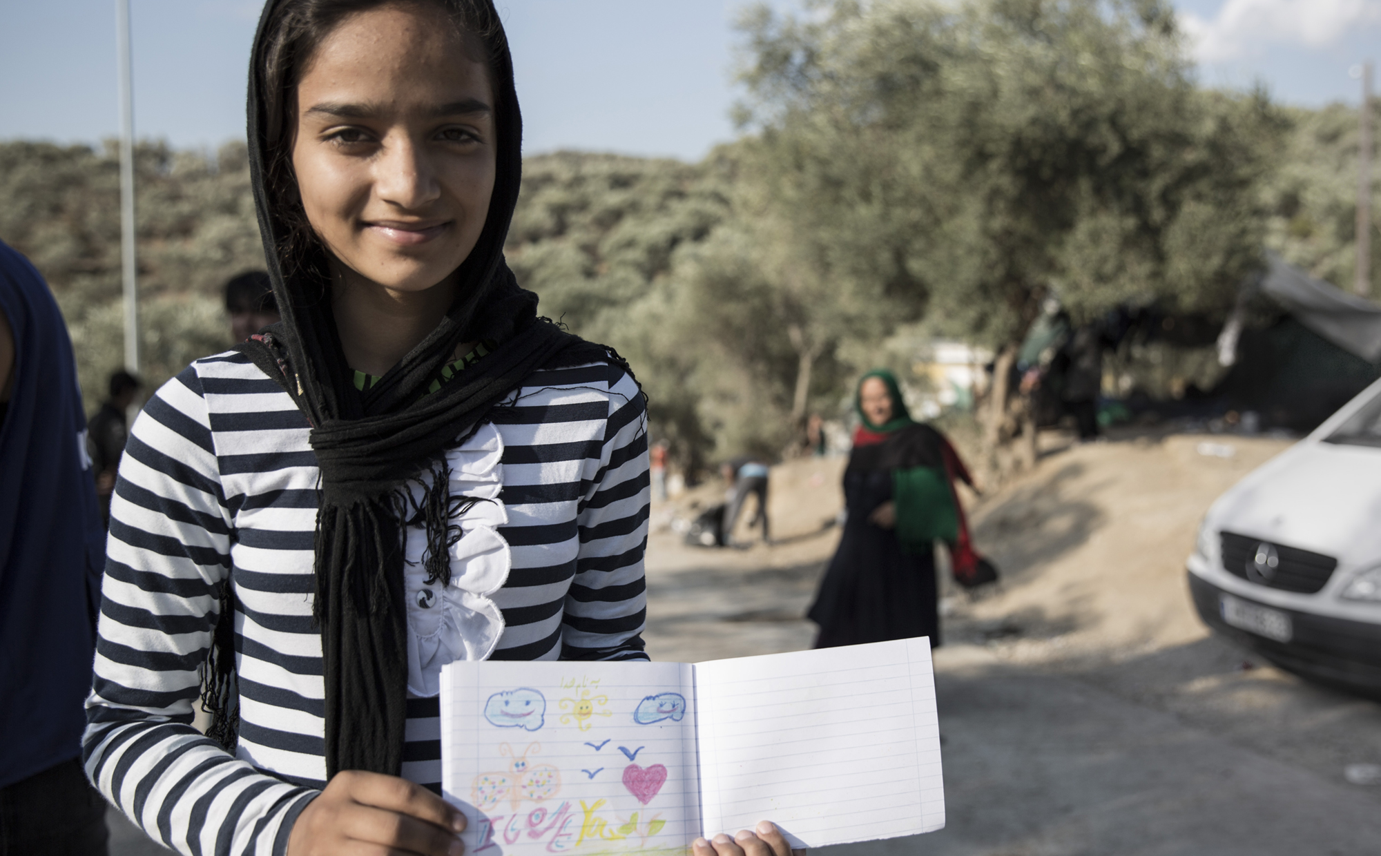 Jonge Syrische vluchtelinge op Lesbos, Griekenland. | Foto: Francesco Malavolta | IOM, 2015