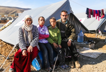 Khalil Ibrahim (rechts), Syrische vluchteling uit Aleppo, vluchtelingenkamp. | Foto: IOM, 2014